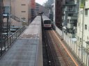 Marunouchi Line runs the ground in the Kourakuen station foreground..
